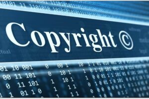 blue copyright graphic and computer code on screen