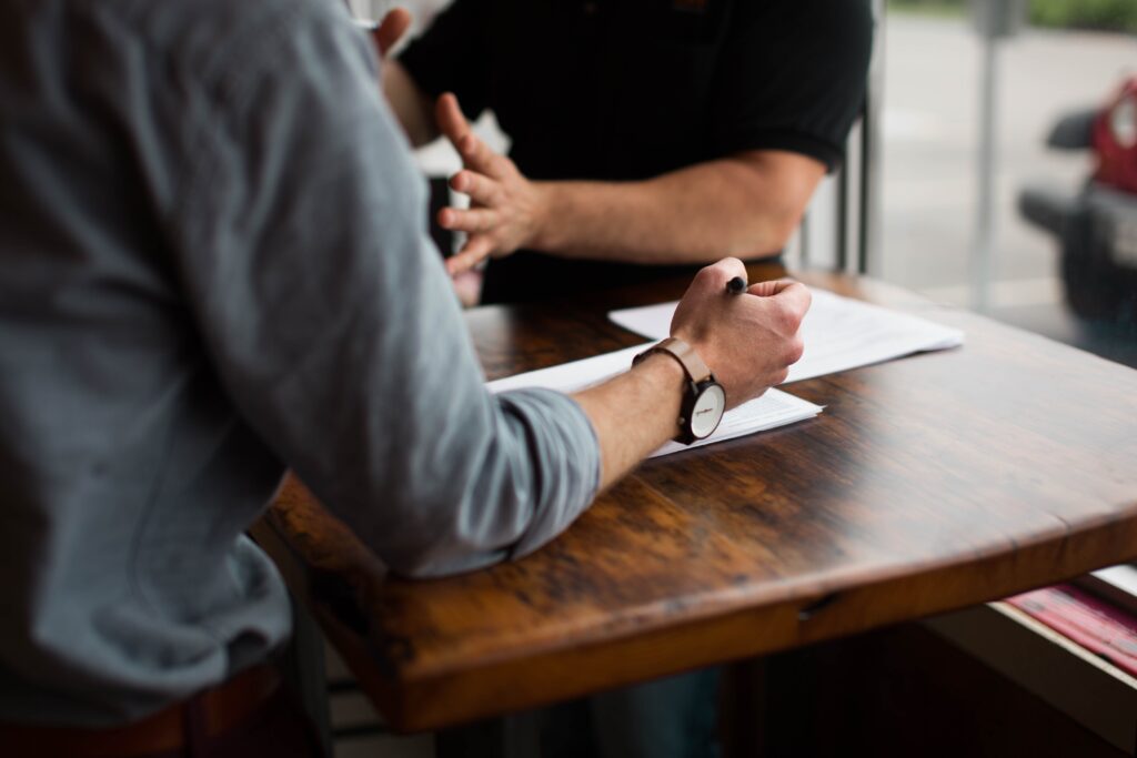 Manger Meeting With Employee To Discuss Discrimination Charges