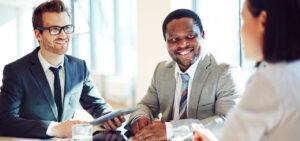 people smiling in meeting