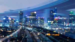 city lights, highway and buildings blurred