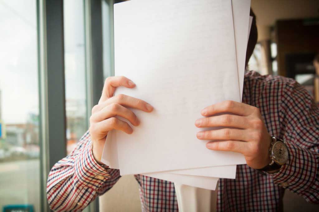 Man organizing estate planning documents