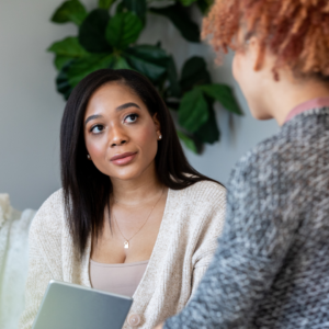 therapist talking to a patient